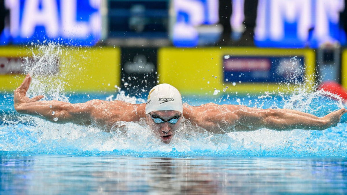 Ryan Murphy swims in the 100 meter butterfly during the 2024 U.S. Olympic Team Trials at Lucas Oil Stadium.