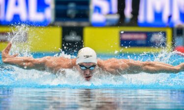 Ryan Murphy swims in the 100 meter butterfly during the 2024 U.S. Olympic Team Trials at Lucas Oil Stadium.