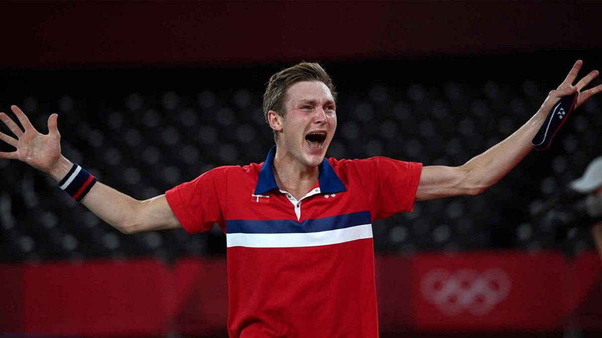 Denmark's Viktor Axelsen celebrates after beating China's Chen Long to win their men's singles badminton final match during the Tokyo 2020 Olympic Games at the Musashino Forest Sports Plaza in Tokyo on August 2