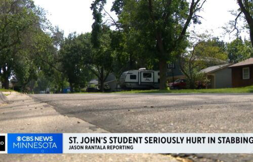 A St. John's University student is seriously hurt after his family said he was stabbed while on a late-night walk near his home.