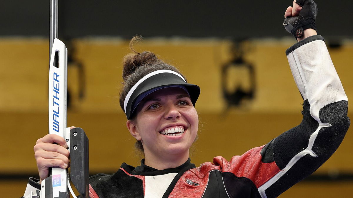Switzerland's Chiara Leone wins the women's 50m rifle 3 positions final