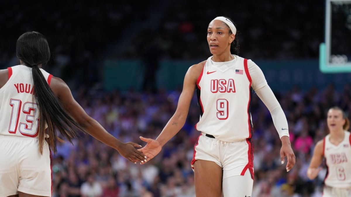 A'ja Wilson high-fives Jackie Young vs. Japan