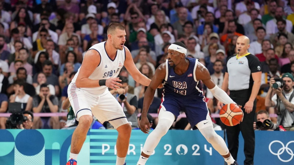 Nikola Jokic guards Bam Adebayo