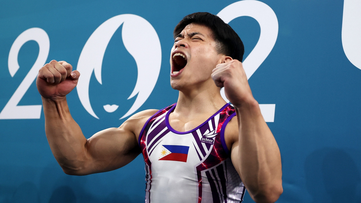 Carlos Yulo of Team Philippines celebrates after finishing his routine during the men's floor exercise final at the 2024 Paris Olympics.