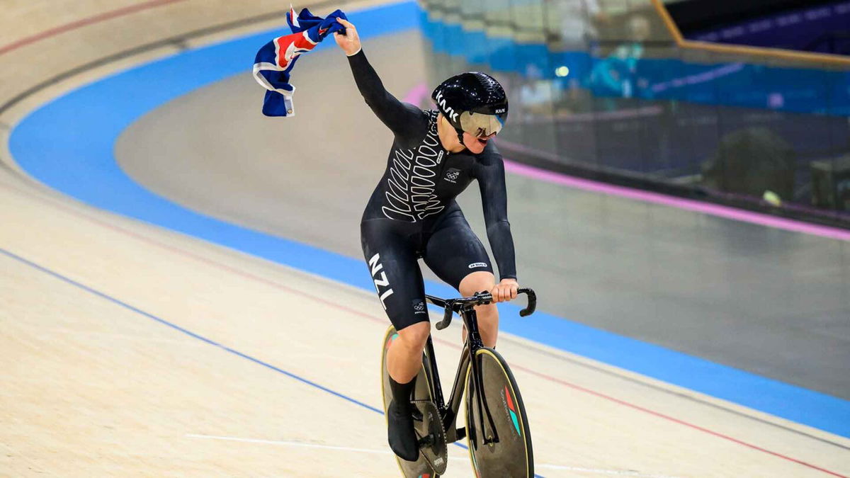 Ellesse Andrews celebrates a women's team sprint silver medal.