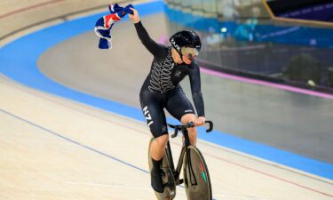 Ellesse Andrews celebrates a women's team sprint silver medal.