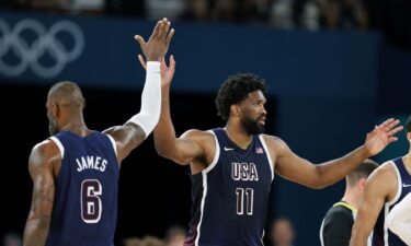 LeBron James and Joel Embiid high-five vs. Brazil