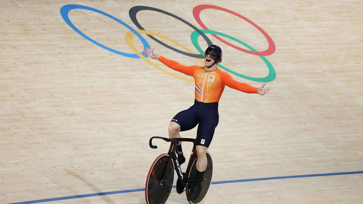 Harrie Lavreysen celebrates winning gold in the men's team sprint.