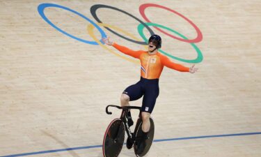 Harrie Lavreysen celebrates winning gold in the men's team sprint.