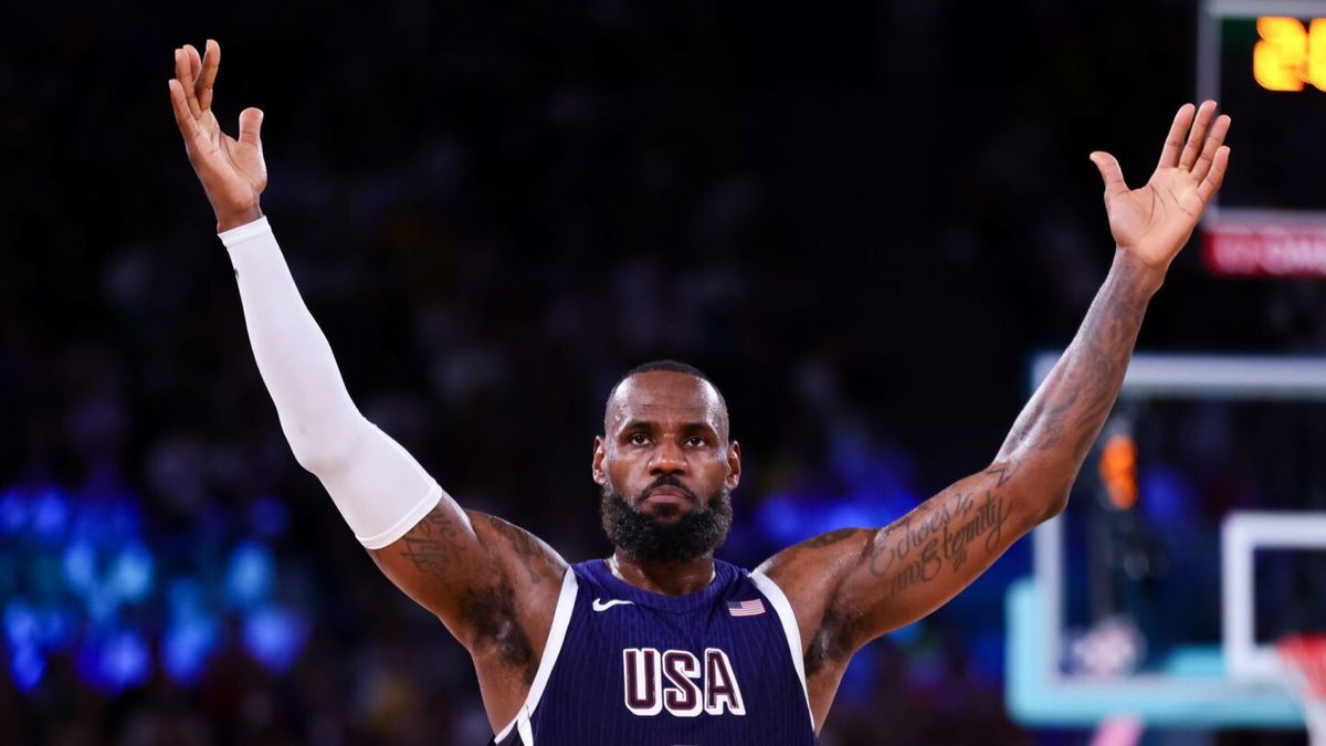 LeBron James holds up his arms vs. Brazil