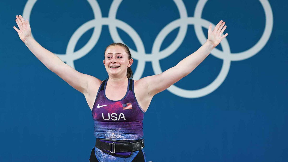 American weightlifter Olivia Reeves celebrates winning a gold medal in the women's 71kg (156 lbs.) competition.