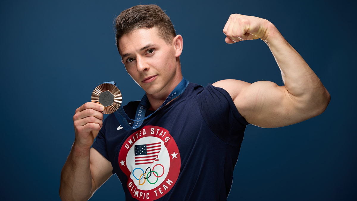 Team USA's Paul Juda poses with his Olympic bronze medal