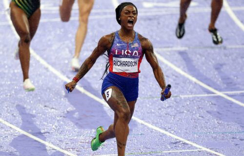 Sha'Carri Richardson celebrates winning the women's 4x100m relay