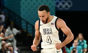 Steph Curry celebrates made 3 vs. Serbia