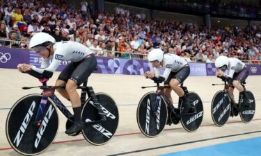 Chloe Dygert leads the U.S. women's team pursuit squad in the first round race.