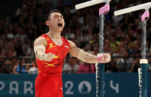 Zou Jingyuan celebrates after nailing his parallel bar routine to win the gold medal at the 2024 Paris Olympics.