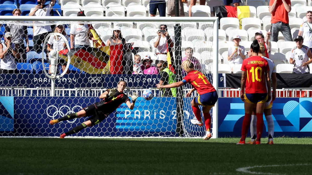 Ann-Katrin Berger makes a save in a match.