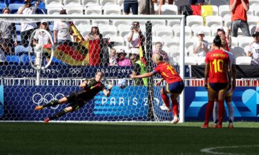 Ann-Katrin Berger makes a save in a match.