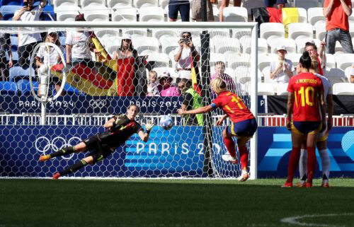 Ann-Katrin Berger makes a save in a match.