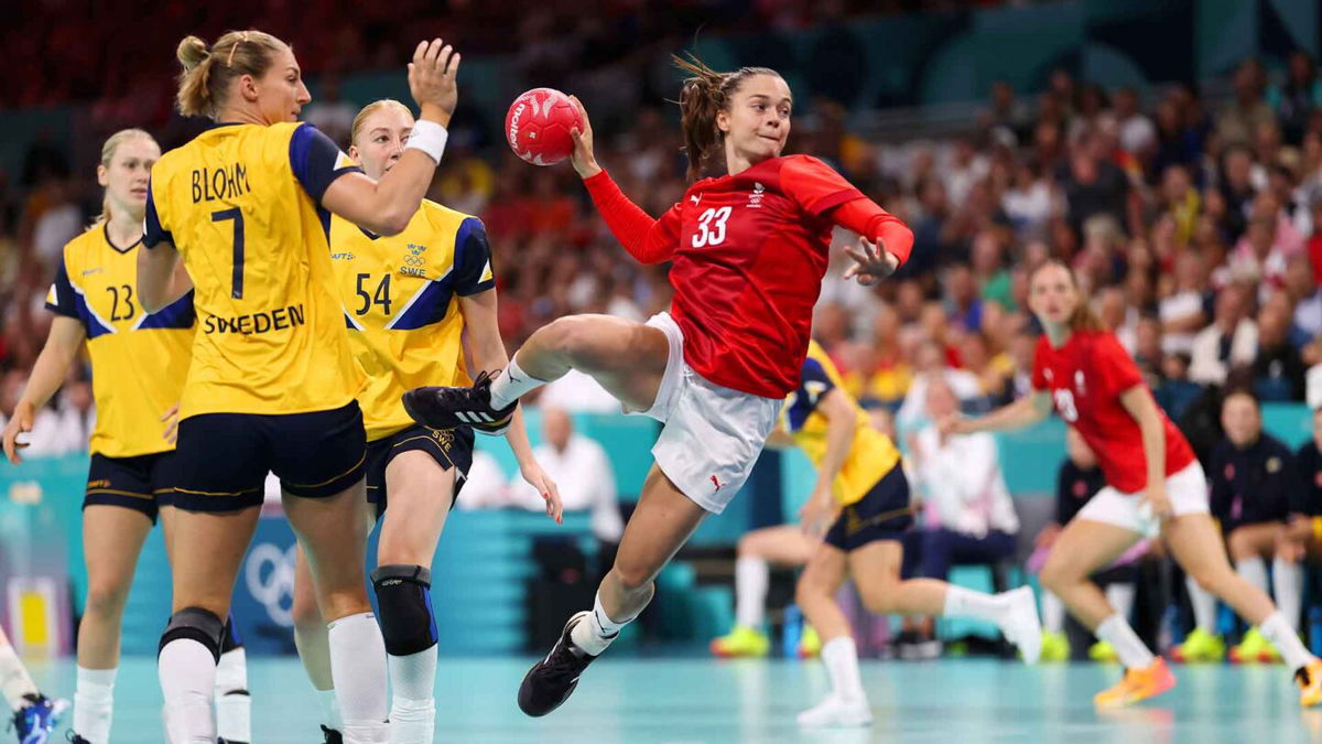 Denmark handball player prepares to take a shot