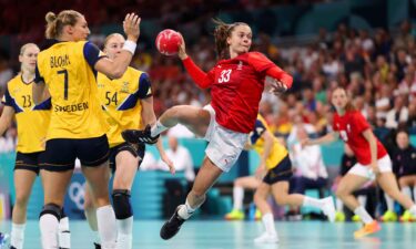 Denmark handball player prepares to take a shot