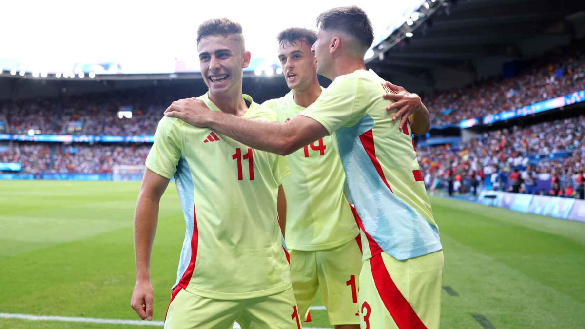 Spain players celebrates after scoring a goal