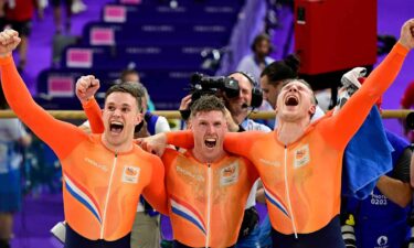 Netherlands celebrates winning gold in the men's team sprint