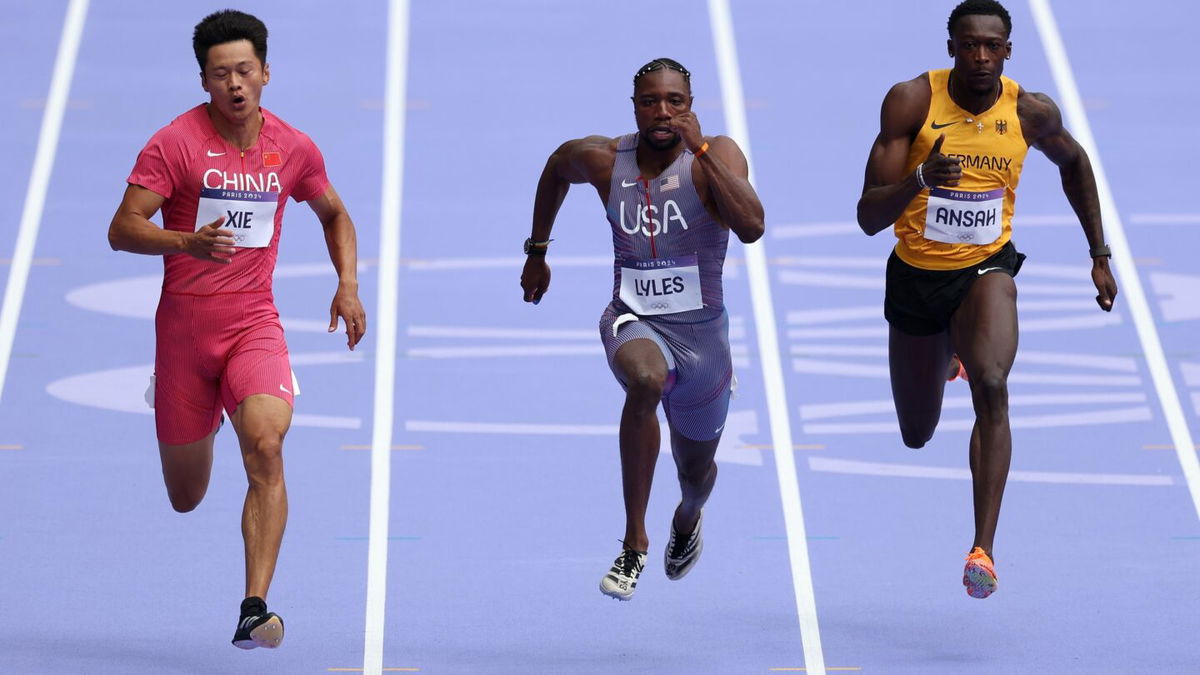 Noah Lyles of the United States competes in the first round of the men's 100m in the 2024 Paris Olympics.