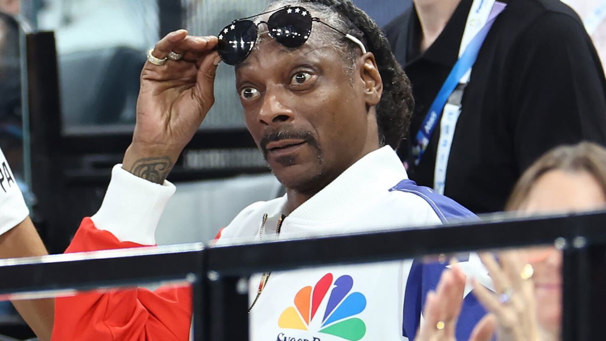 Snoop Dogg attends the United States' women's gymnastics qualifying session at the 2024 Paris Olympics.