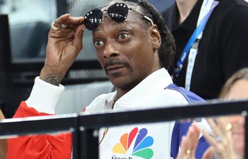 Snoop Dogg attends the United States' women's gymnastics qualifying session at the 2024 Paris Olympics.