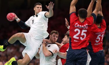 Sebastian Heymann of Germany attempts a shot against Spain in the 2024 Paris Olympics.