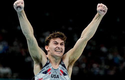 Stephen Nedoroscik celebrates with his U.S. gymnastics teammates after his pommel horse performance clinched the team's first Olympic medal since 2008.