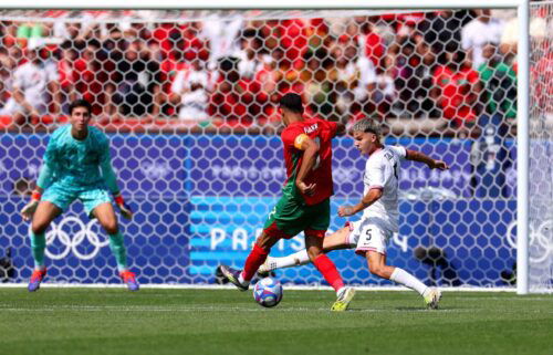 Achraf Hakimi shoots the ball.