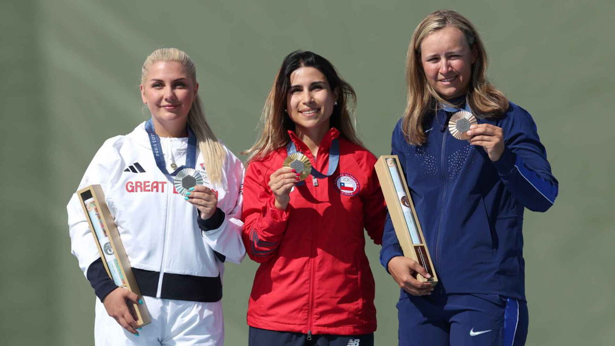 Austen Smith poses with her bronze medal.