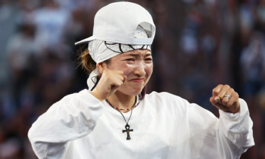 B-Girl Ami of Japan reacts to her victory in the first-ever Olympic breaking event.