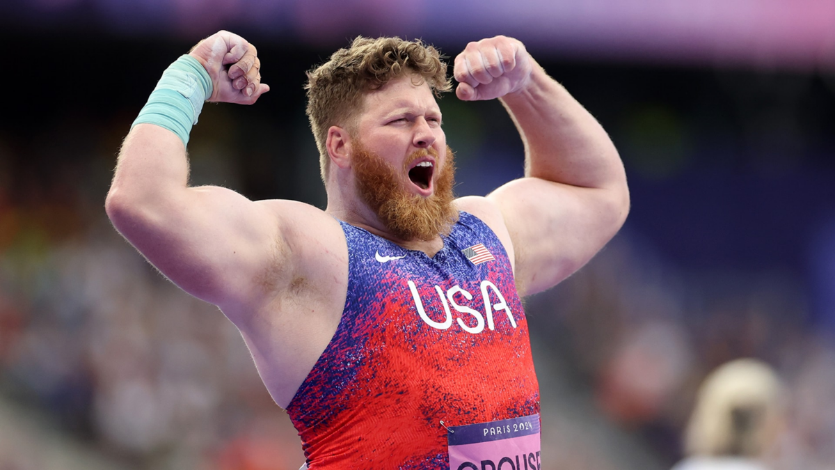 Ryan Crouser reacts during the men's shot put final at Stade de France.