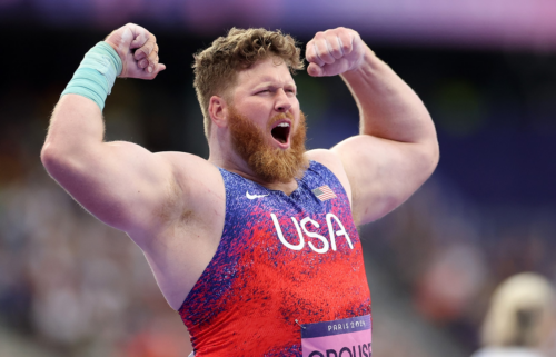 Ryan Crouser reacts during the men's shot put final at Stade de France.