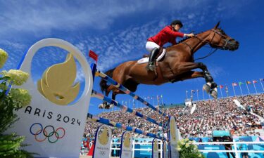 Karl Cook and horse Caracole De La Roque of Team United States compete in the Jumping Individual Final in Versailles