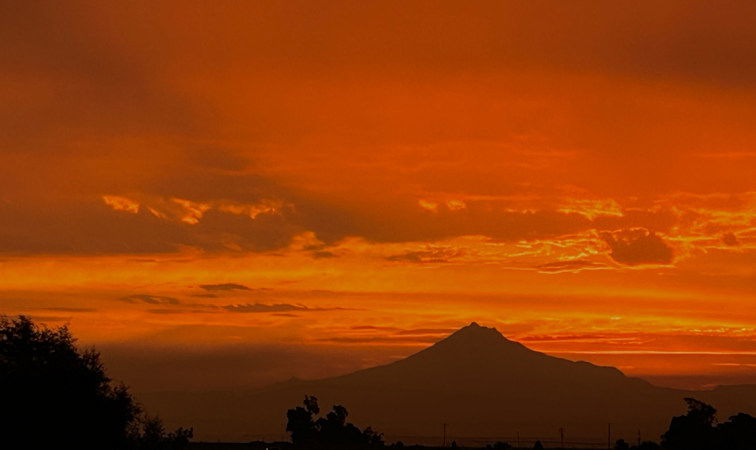 Smoky sunset during fire season in Central Oregon