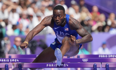 Grant Holloway competes in men's 110m hurdles during the Paris Olympic Games at Stade de France.