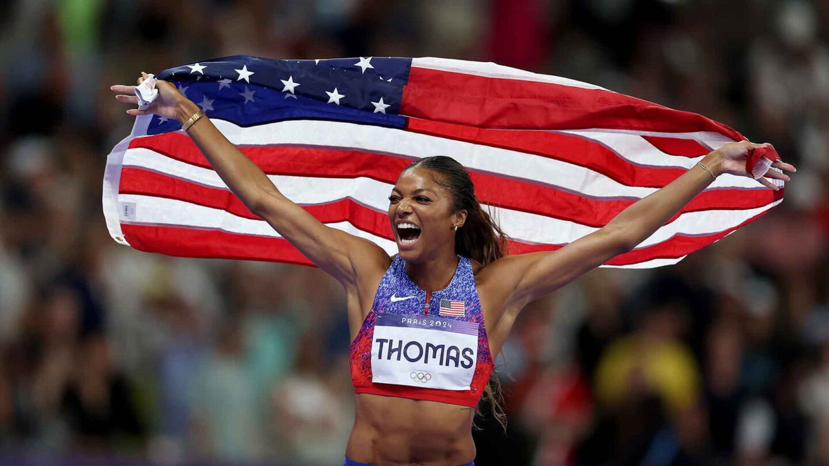 Gold medalist Gabrielle Thomas of Team United States celebrates winning the gold medal in the Women's 200m Final at Stade de France.