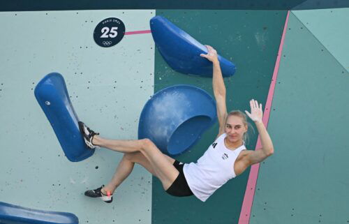 Janja Garnbret celebrates topping a boulder