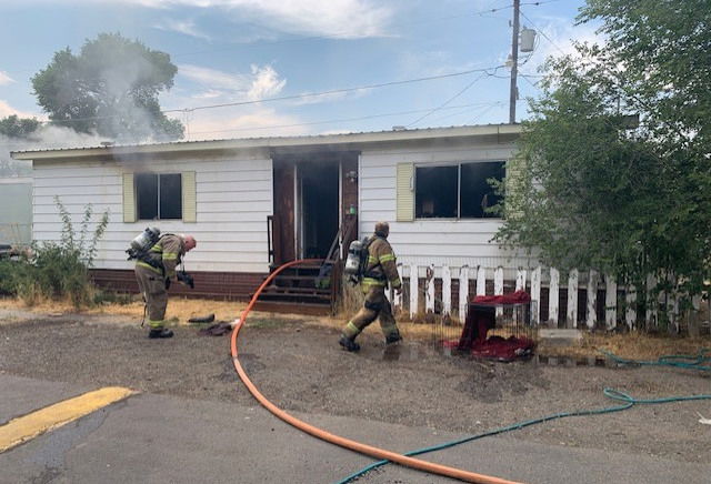 Five dogs die in Madras mobile home fire, firefighters rescue two more; resident hospitalized with smoke inhalation