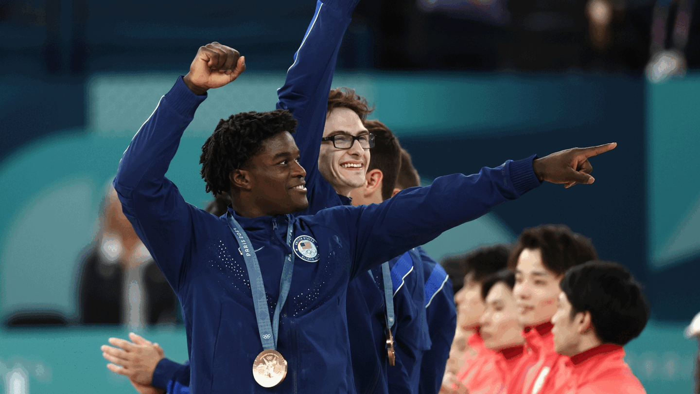 Frederick Richard and Stephen Nedoroscik celebrate after winning bronze for Team USA