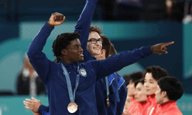 Frederick Richard and Stephen Nedoroscik celebrate after winning bronze for Team USA