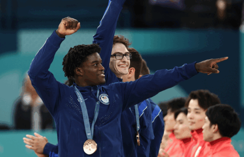 Frederick Richard and Stephen Nedoroscik celebrate after winning bronze for Team USA