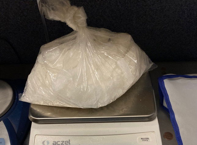 Central Oregon drug agents display large quantity of methamphetamine seized in traffic stop of Salem-area motorcyclist