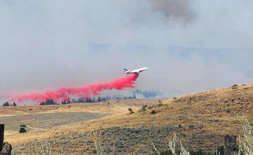 Air tanker drops retardant on the Town Gulch Fire in Baker County.