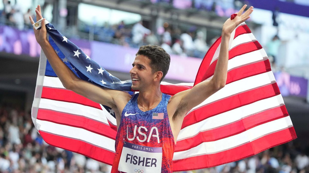 Grant Fisher with American flag