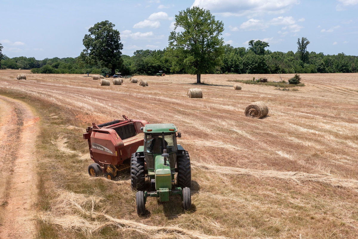 <i>Steve Helber/AP via CNN Newsource</i><br/>The Biden administration is sending out millions of dollars in relief checks to farmers who have faced discrimination